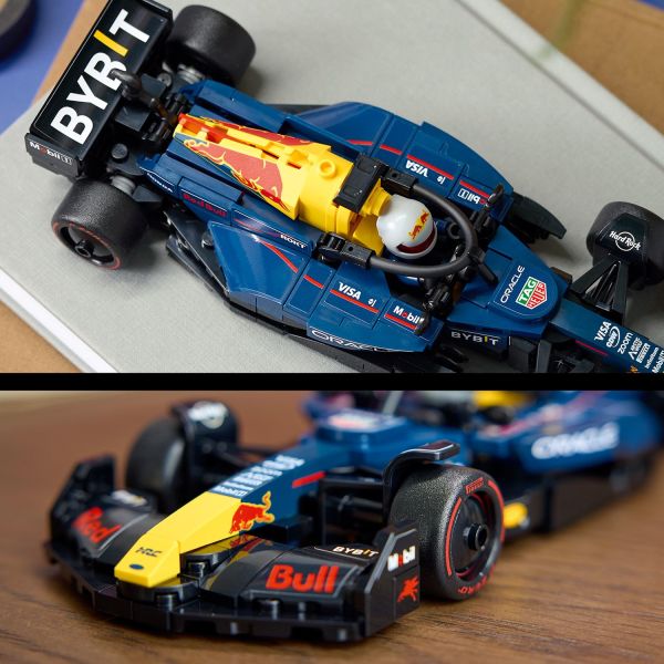Includes rear wing, sponsor logos and wider rear tires.