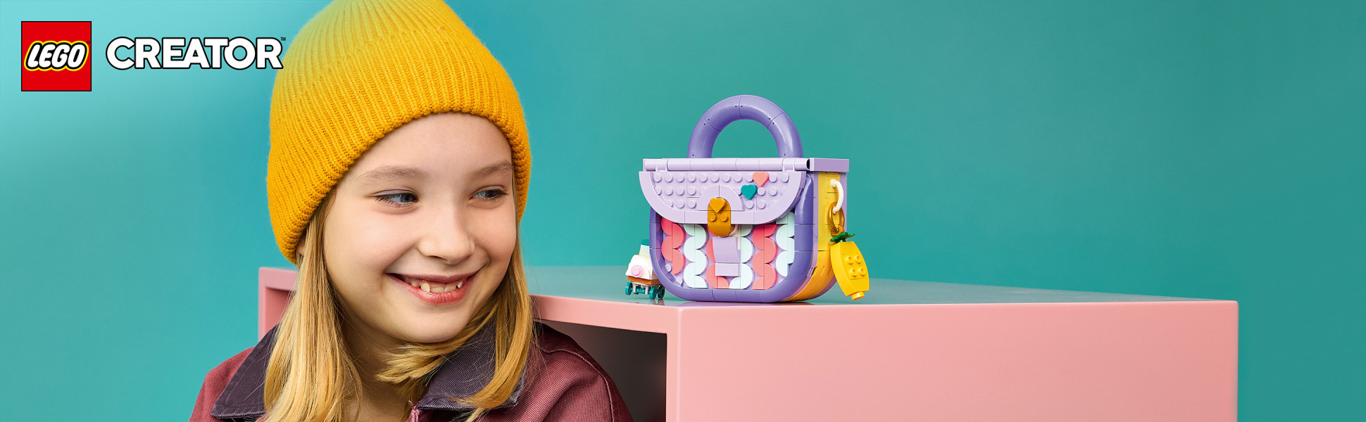 Kids can build a LEGO Creator 3 in 1 Art Fashion Bag with Storage, then rebuild it into a suitcase or a storage box.