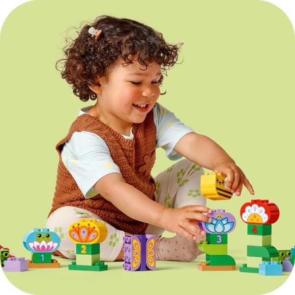 Toddlers keep trying until they make a garden they like.