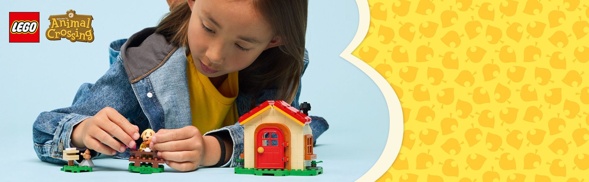 The set includes a minifigure of an adorable dog, Goldie, and a buildable house containing a bed and a piano.