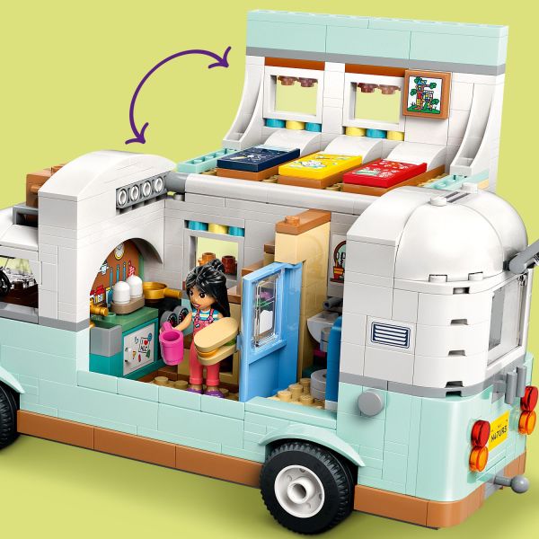 Lift off the camper van’s roof to reveal the bedroom.