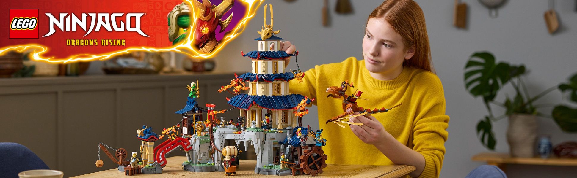 Tournament Temple City playset for kids featuring a posable dragon, an airship and 13 NINJAGO minifigures.