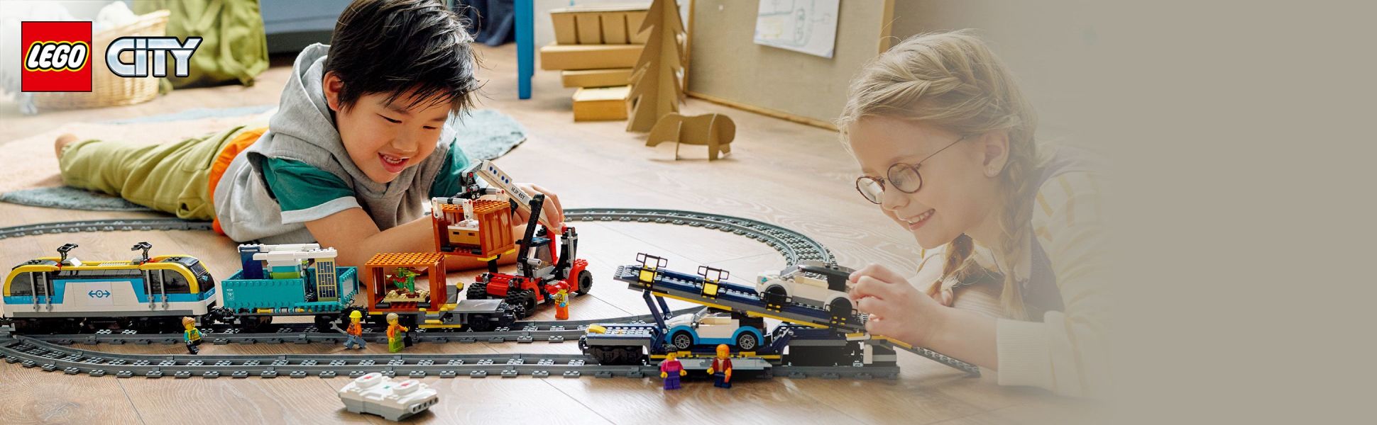 LEGO City Freight Train Set, 60336 Remote Control Toy for Kids Aged 7 plus  with Sounds, 2 Wagons, Car Transporter, 33 Track Pieces and 2 EV Car Toys 