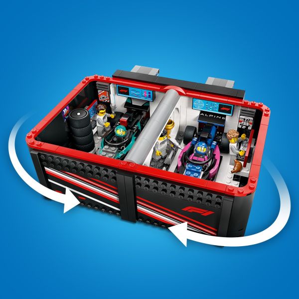 The fold-away playset includes a built-in carrying handle.