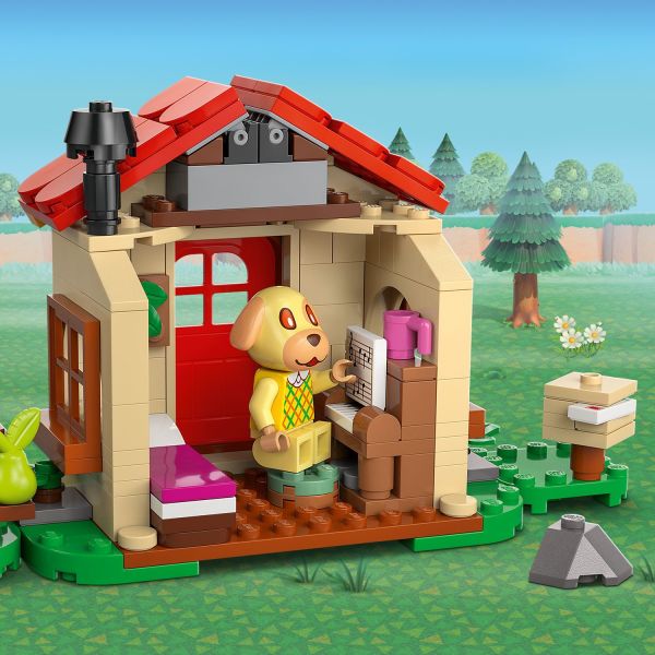 A house to build, with a bed, piano and postbox.