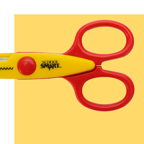 Close-up product view of decorative scissors designed to create patterned paper edges.