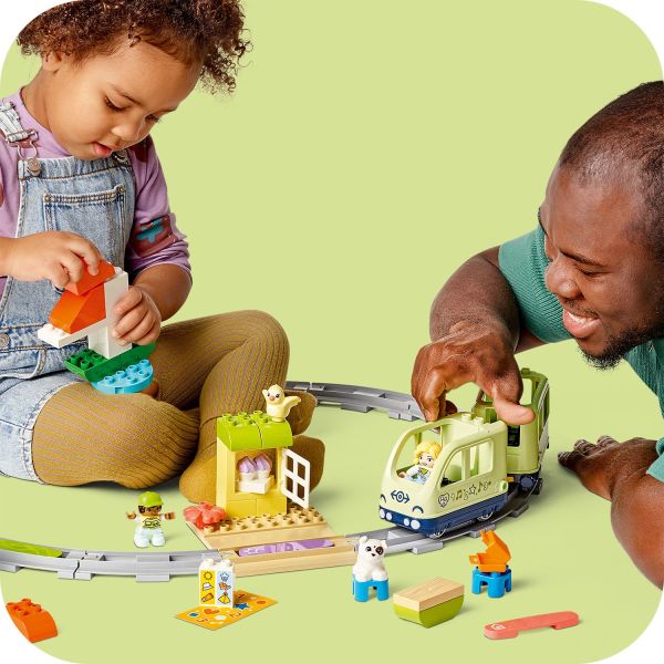 Toddlers choose then construct the holiday locations.