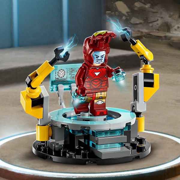 MK6 is being repaired by 2 robotic arms.