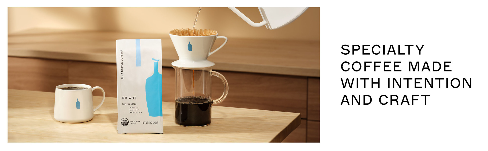 A bag of Bright, a full mug and a pourover. Specialty coffee made with intention and craft.