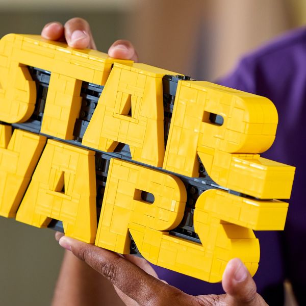 Capture the smooth contours of each yellow letter.