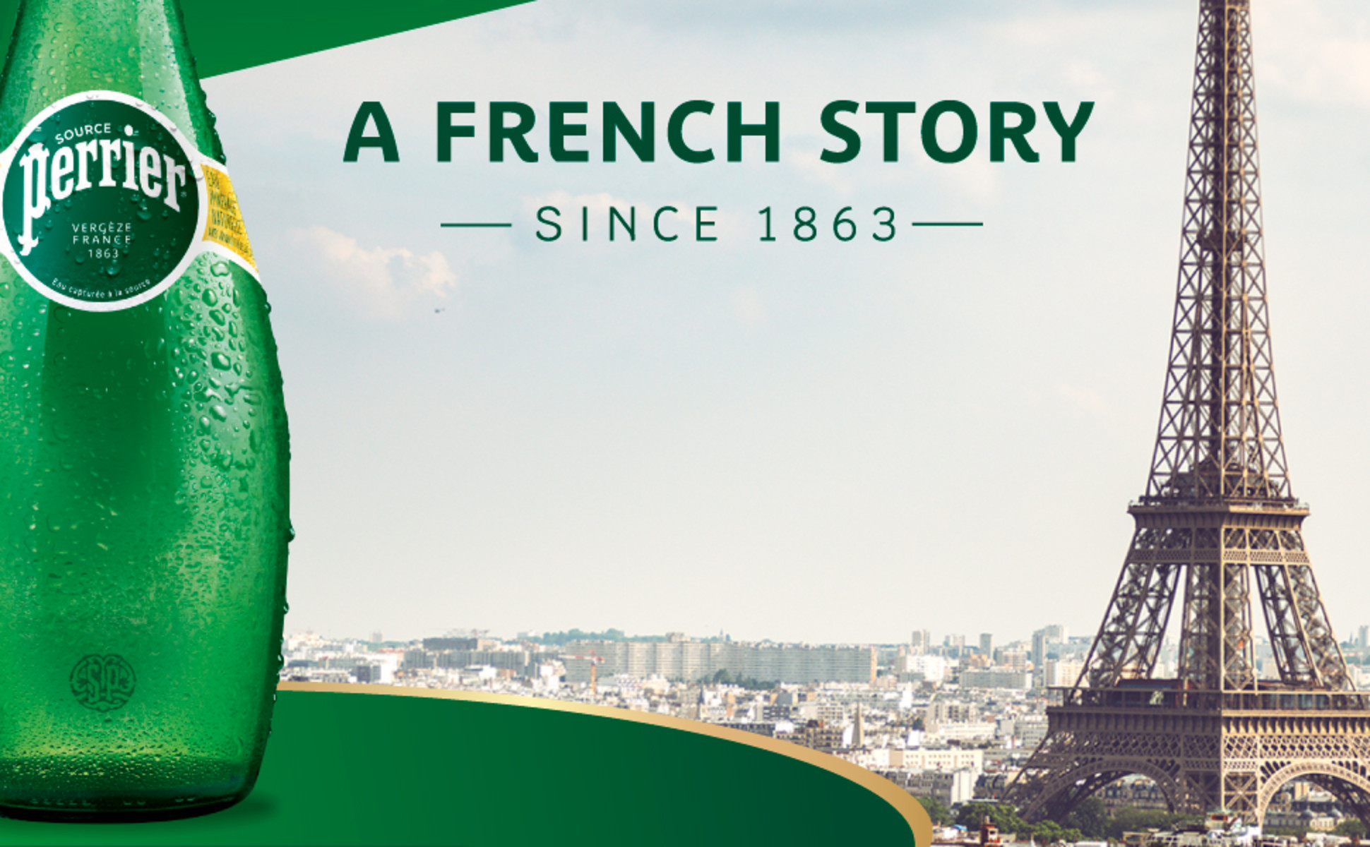 Green mineral water bottle with Eiffel Tower. Perrier has been a  French story since 1863.
