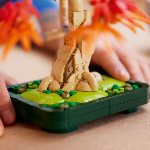 The LEGO tree comes with a dark green pot for easy display.