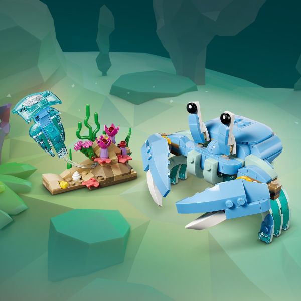 Posable crab comes with a jellyfish and sea plants.