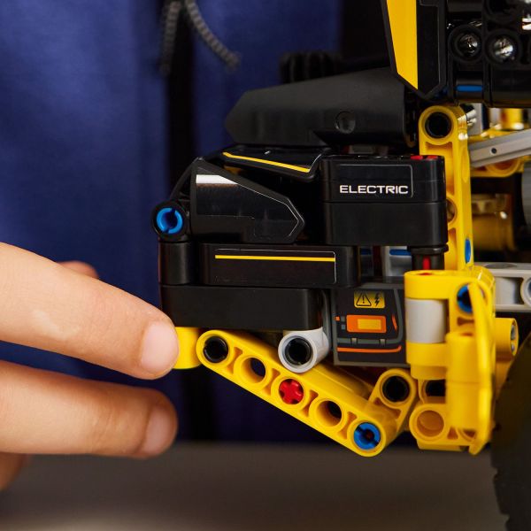 Model not motorized – kids can pretend to charge the loader.