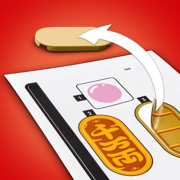 Add the gold coin or the wish for good fortune to the tummy.