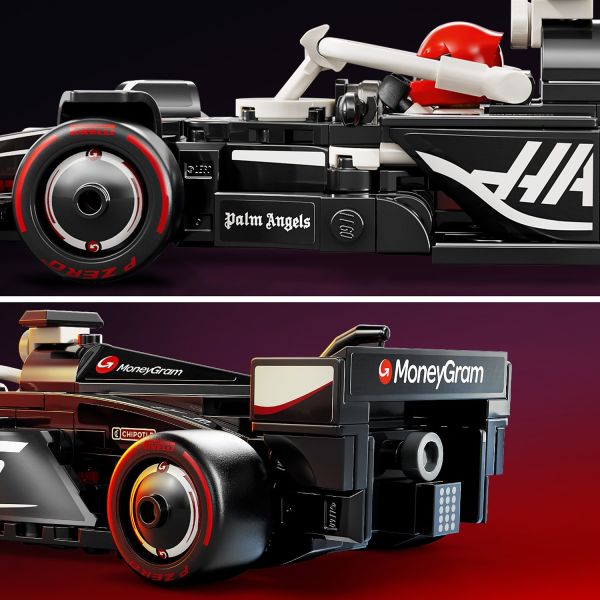 Race car includes team-sponsor logos and a rear wing.