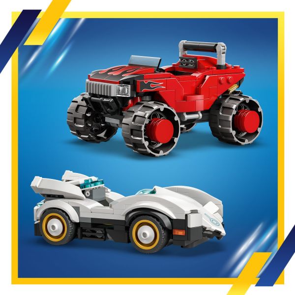 Red and black monster truck toy and white race car with fins.