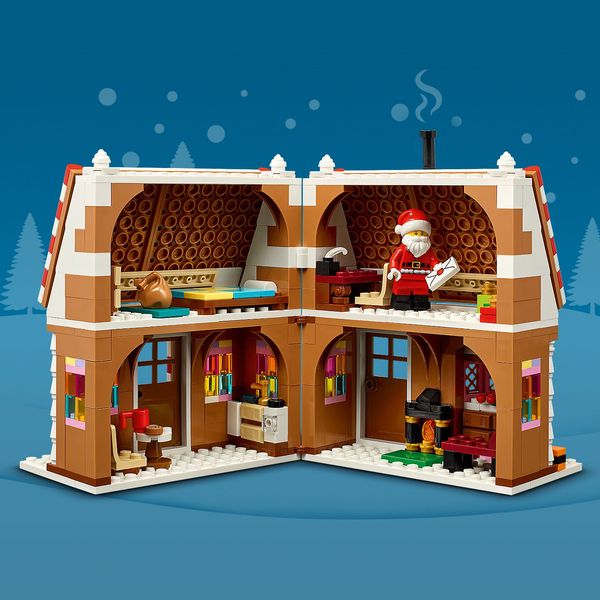 Model opens to reveal Santa’s desk, fireplace and bedroom.