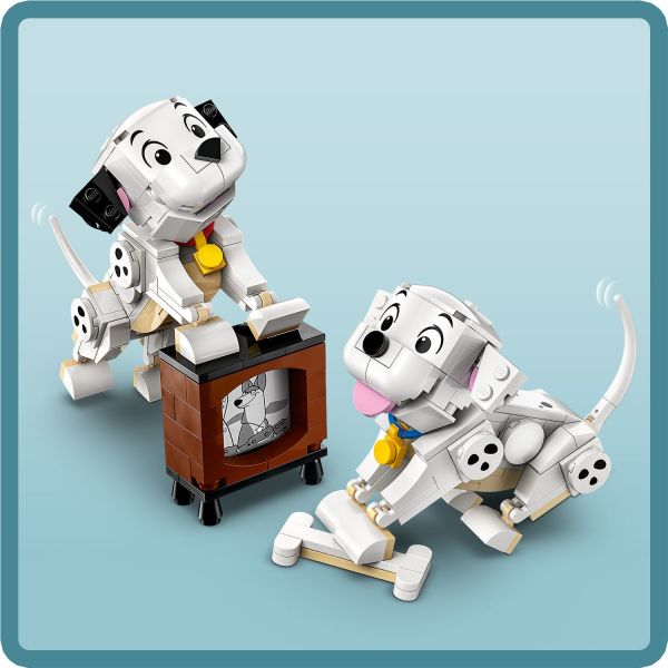 Includes a brick-built bone and a small TV for extra play.