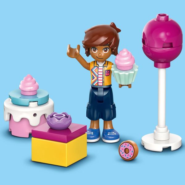 Includes a birthday gift, cake, balloon and donut.