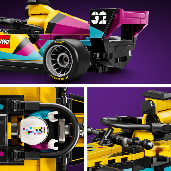 Race car includes a cockpit, rear wing and halo.
