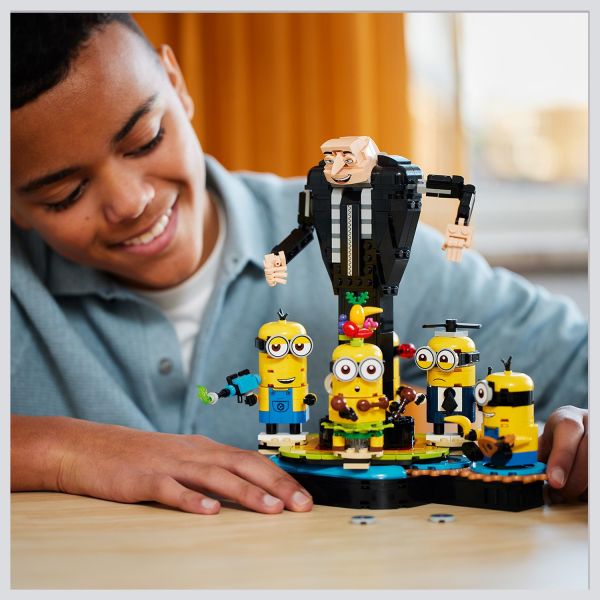 Turn the seated Minion to make the others dance around Gru.
