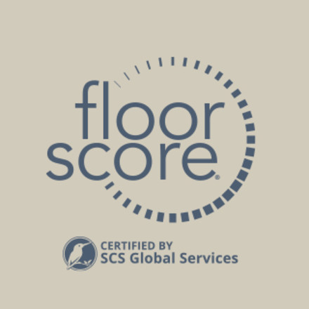 A beige background with the FloorScore® logo, the SCS logo, and the words “Certified by SCS Global Services”