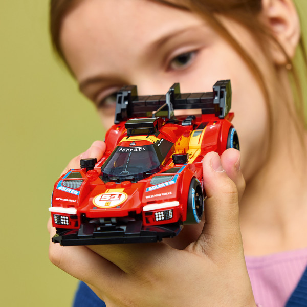 Build a LEGO Ferrari 499P toy car.