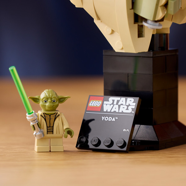 Rebuild the stand slightly and add the Yoda LEGO minifigure.