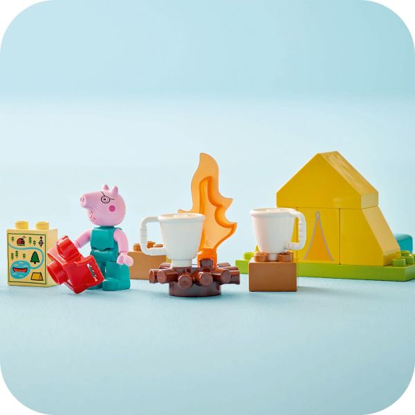 Includes canoe toy, map, tent, mugs, campfire and a camera.