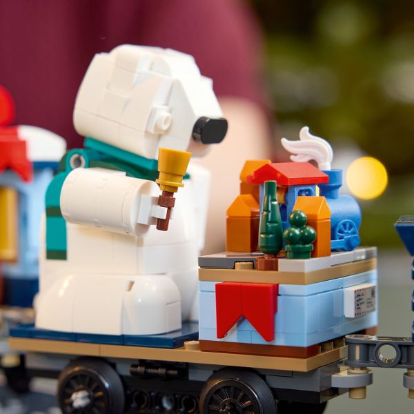 A bell-ringing polar bear adds cheer to every train journey.