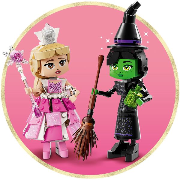 Building toy comes with Glinda’s tiara and Elphaba’s broom.