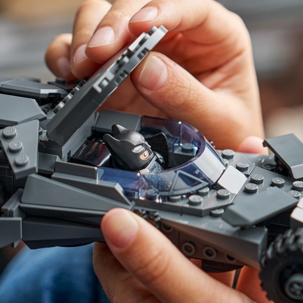 Batman minifigure can sit inside the vehicle’s cockpit.