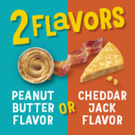 A slice of bacon sitting alongside a bowl of peanut butter and a wedge of cheddar jack cheese.