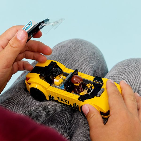 Open the hood to view the toy electric motor.