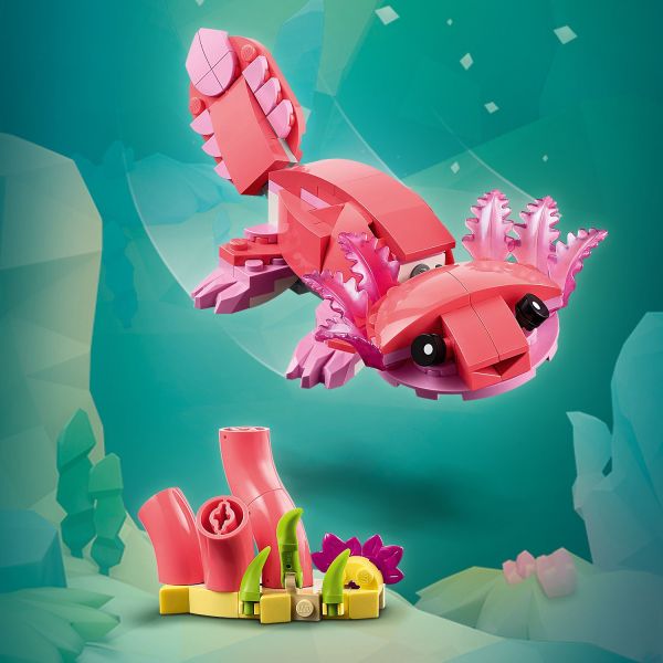 Axolotl toy comes with underwater plants.