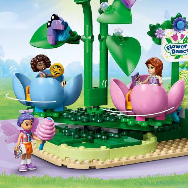 Take Aliya, Liann and Autumn for a spin on the ride.