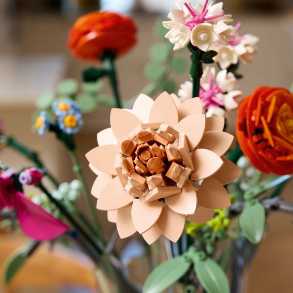 Includes orchids, ranunculus and a dahlia.