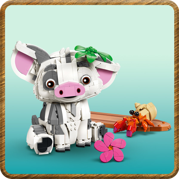 Building set features Pua the pig and a crab for play options.