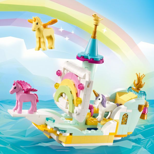 Model ship features a rainbow sail.