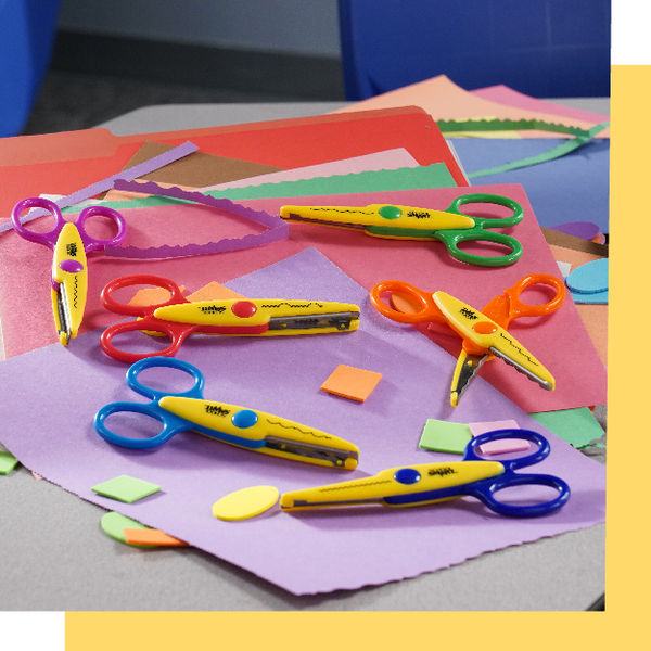Decorative paper edger scissors shown with crafting materials for creative projects.
