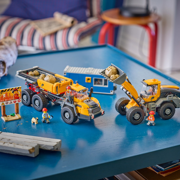 Realistic dump truck and front end loader for imaginative play.