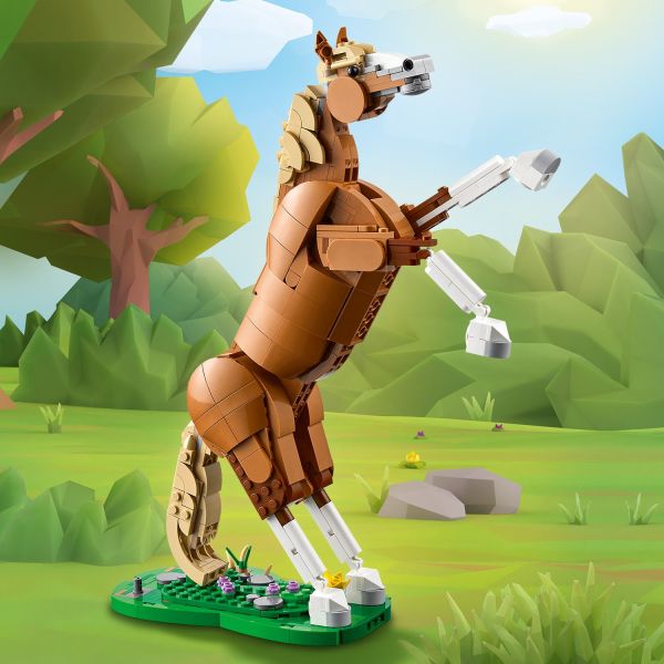 Model has posable head, neck, hips, tail and one knee.
