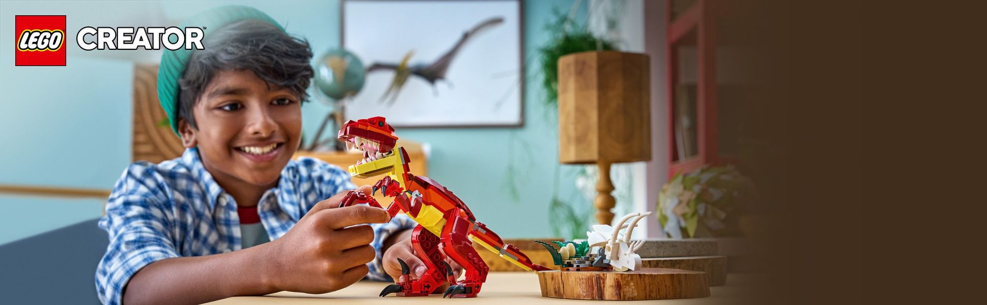 LEGO Creator 3 in 1 Fierce Dinosaur set lets kids build a Velociraptor toy then rebuild it into a Stegosaurus or Pterosaur.
