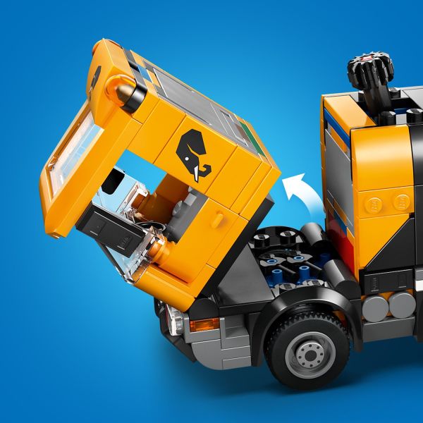 Lift the cab to reveal the toy engine.