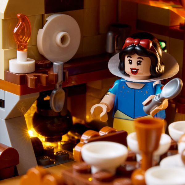 The kitchen has a hearth with a light brick to add a glow.