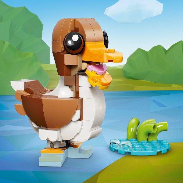 Bird has a posable head and comes with a pond accessory.