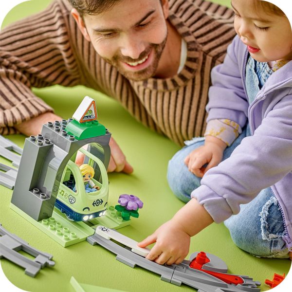 Toddlers figure out where they want their track to go.