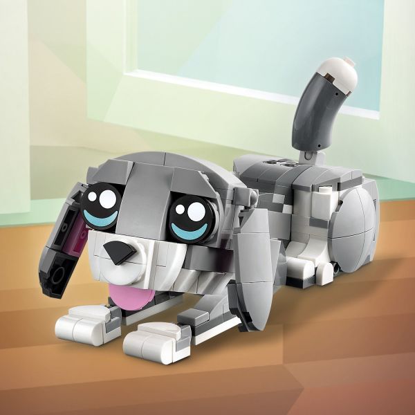 The dog figure has a movable head, tail, legs and paws.