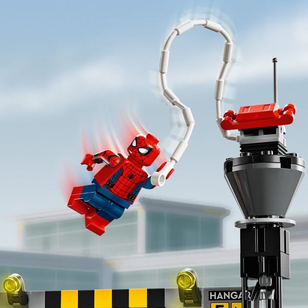 Attach Spider-Man’s web to different parts of the playset.